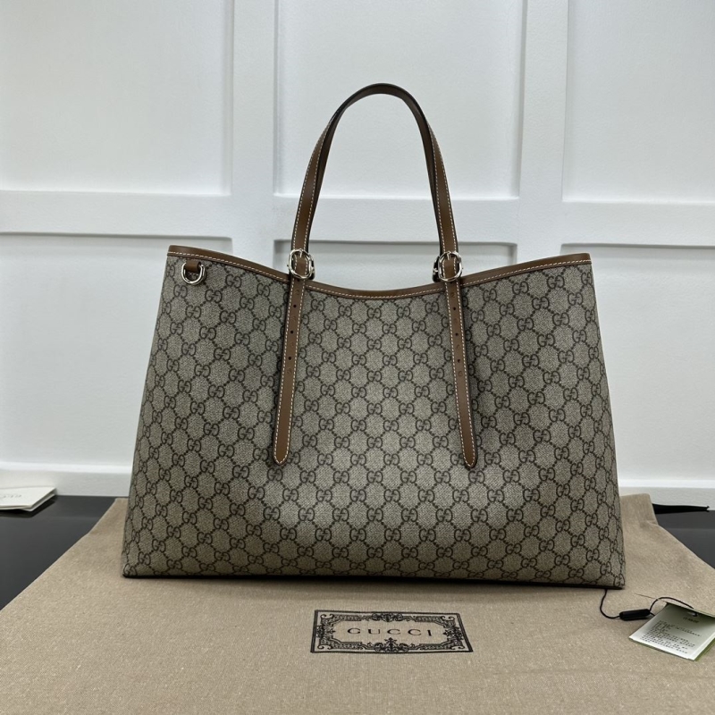 G*u*i shopping bags